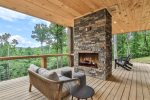 Lower Deck With An Outdoor Gas Fireplace